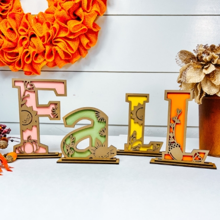 layered decorative fall letters with sunflowers leaves and acorns